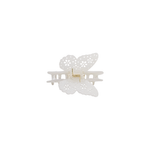 A white butterfly-shaped hair claw clip with delicate cutout details and a small gold metal spring in the center, shown on a plain white background.